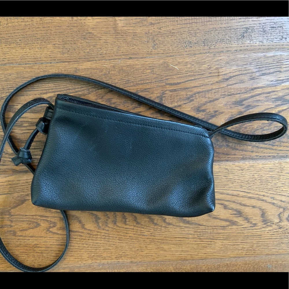 Soft black leather; pristine, unique, edgy, asymmetrical, 2 zip parts, sh strap